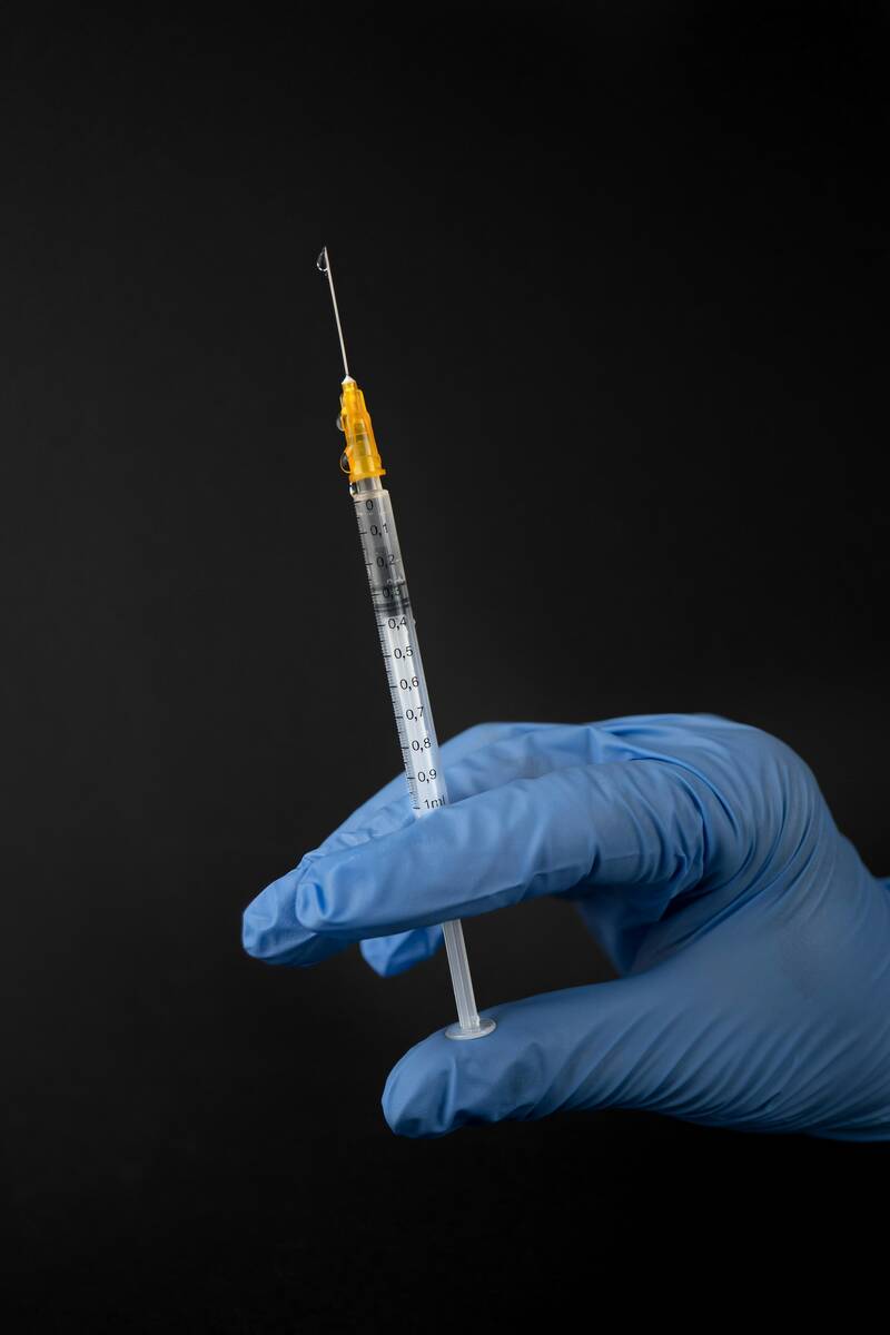 A syringe with vaccination in it! (okay it's water, jk) 