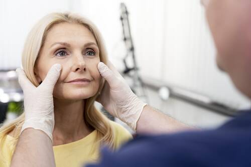 Close up doctor checking patient